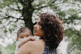 Woman holding infant