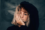 Woman touching her hair