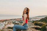 Woman sitting on hill