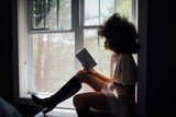 woman reading book